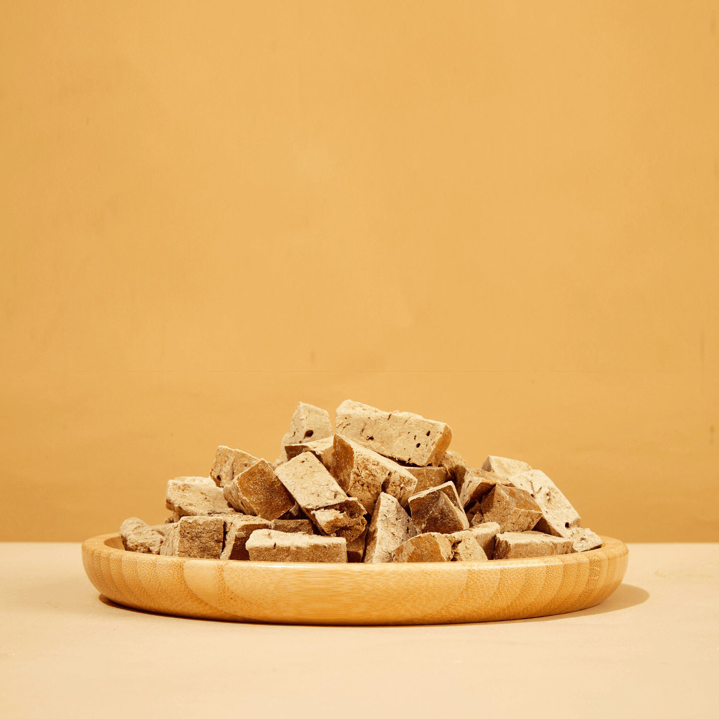 Freeze-dried beef liver dog treats showing natural texture and cube size