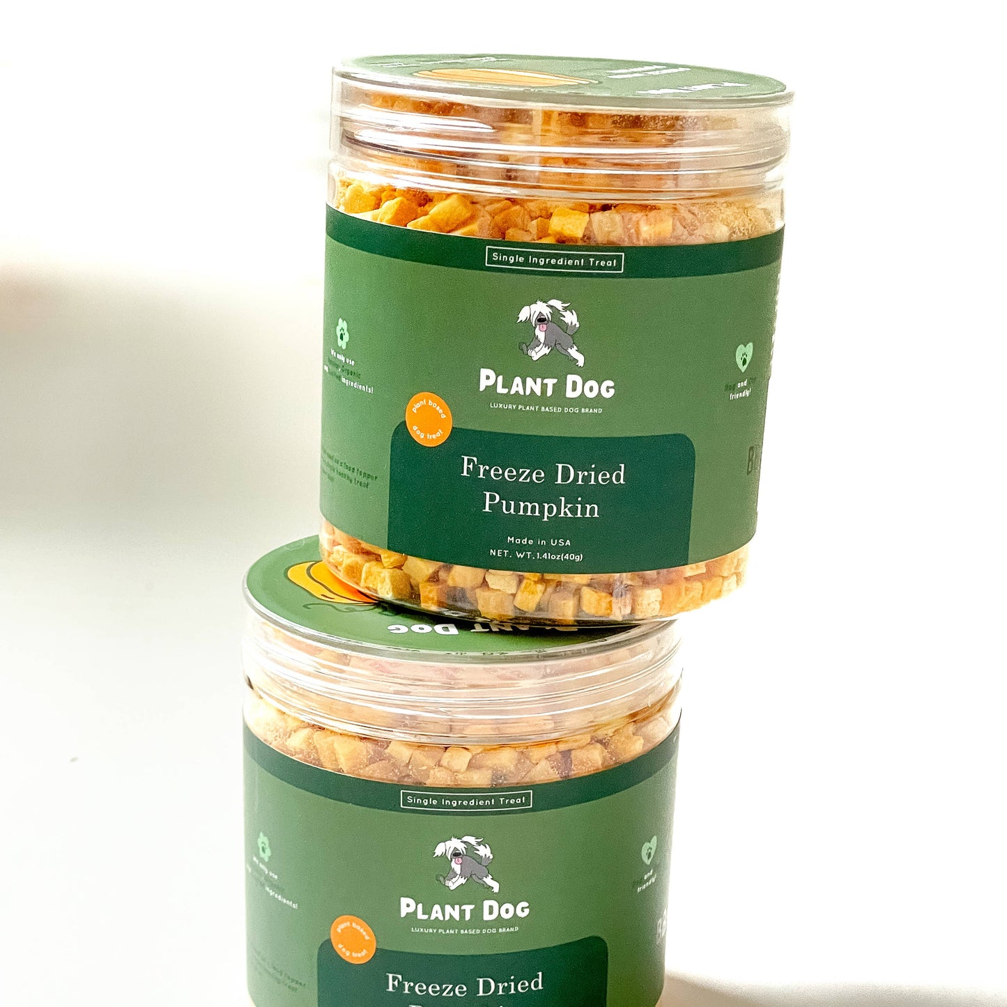 Stacked jars of organic freeze-dried pumpkin dog treats, clean ingredient dog treats