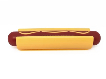 Side view of hot dog shaped nylon dog chew toy made in the USA for power chewers