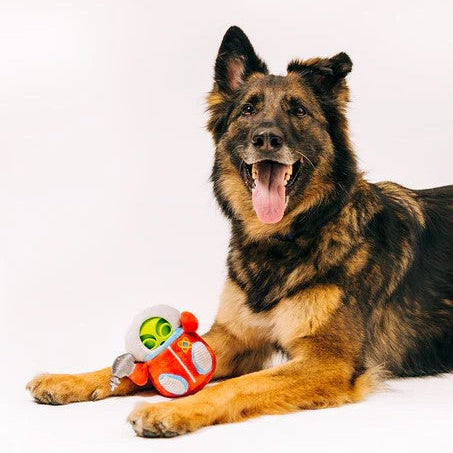 German Shepherd playing with the Alien Explorer enrichment dog toy