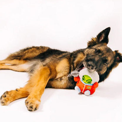 German Shepherd chewing and playing with the Alien Explorer interactive dog toy