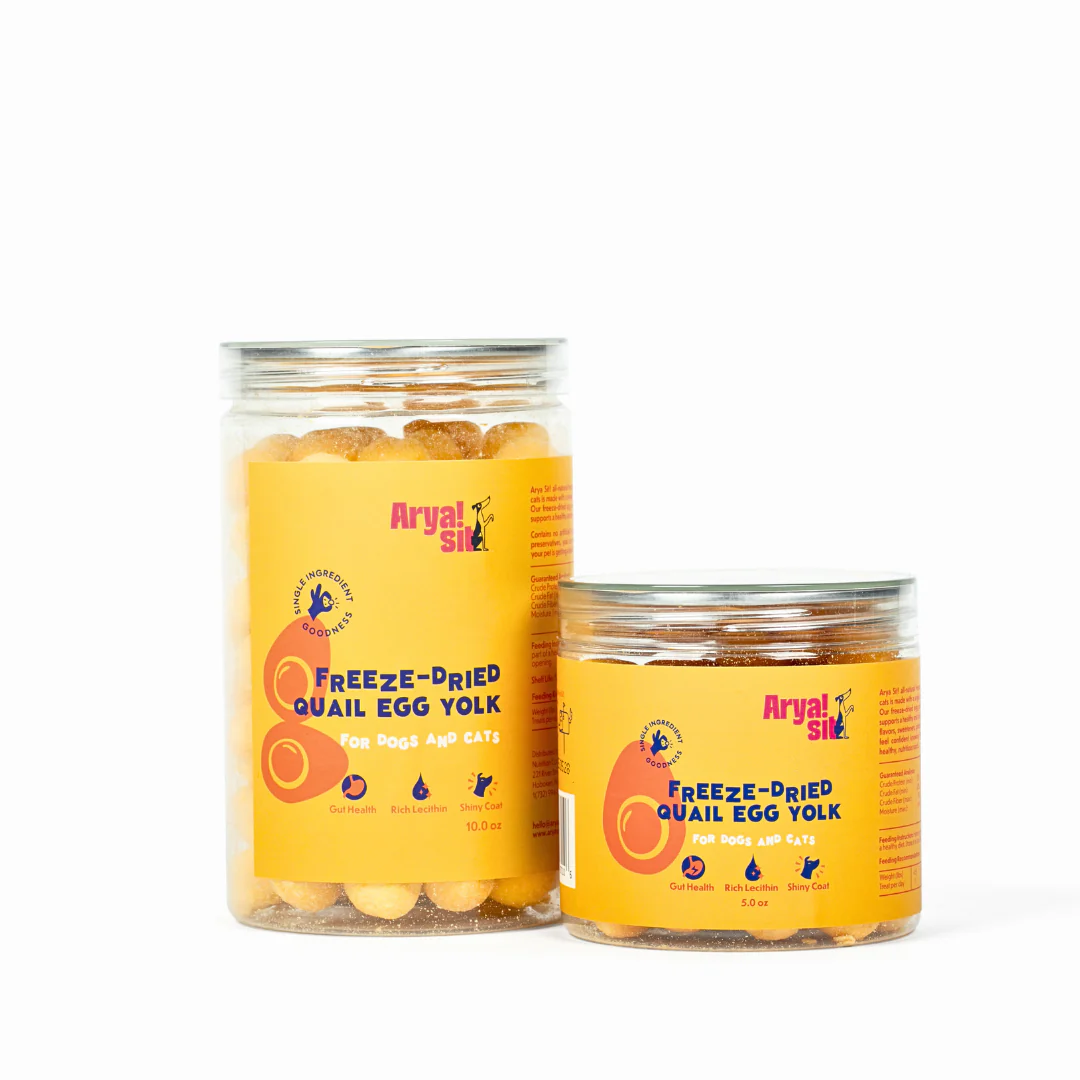 Two jars of freeze-dried egg yolk dog treats, a nutrient-dense option for mindful snacking
