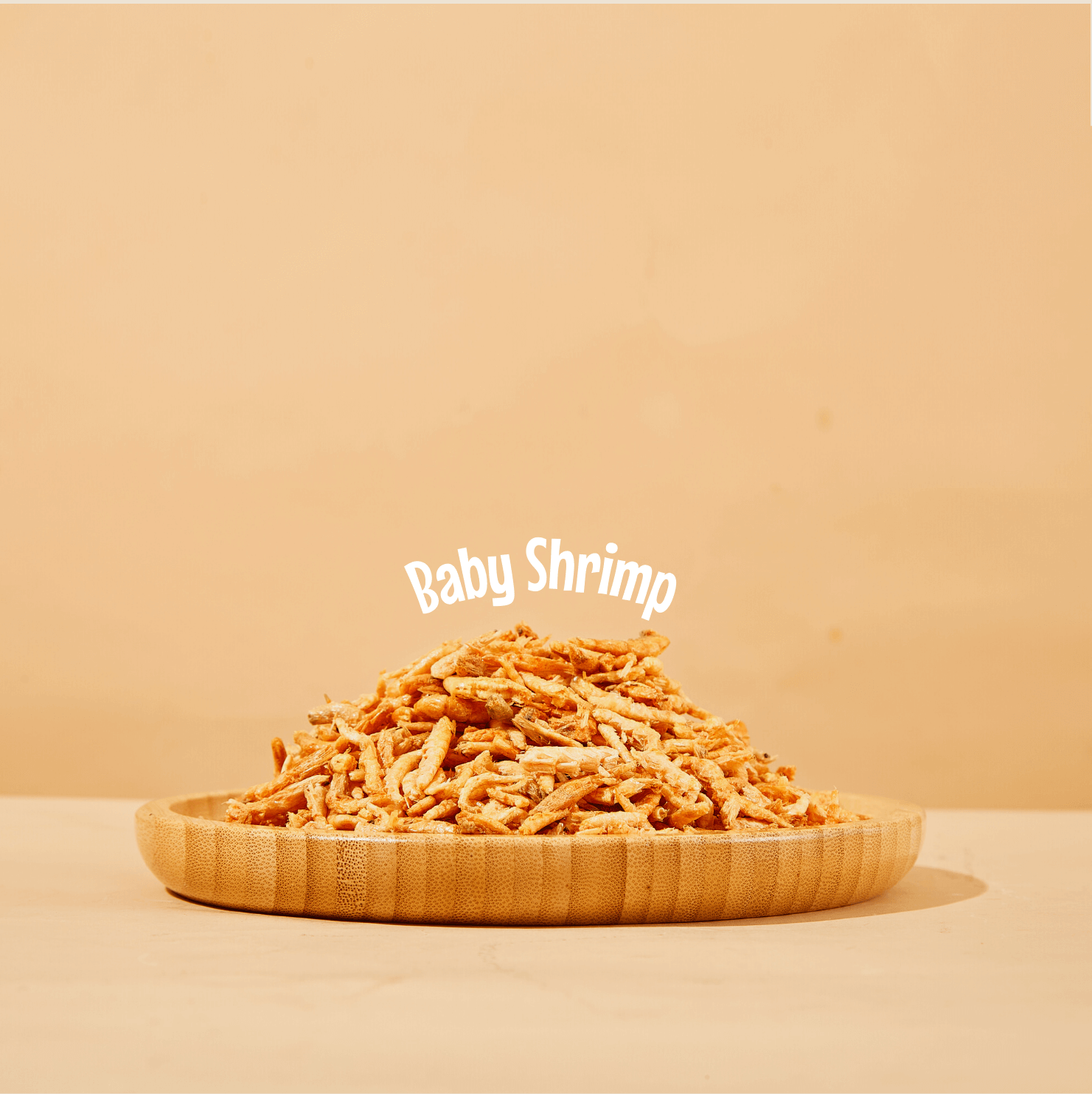 Freeze-dried baby shrimp dog treats displayed on plate