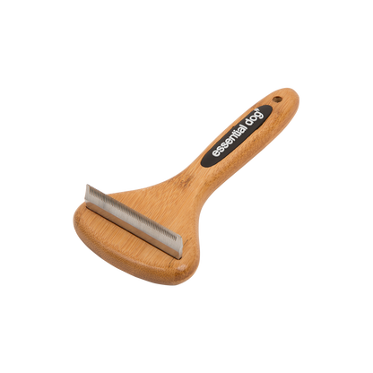 Bamboo deshedding dog brush with stainless steel blade designed to remove loose hair from short coats