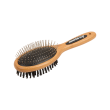 Bamboo dog grooming brush with natural bristles designed for gentle brushing and everyday coat care