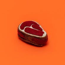 Non-toxic boiled wool steak dog toy made from natural lambswool