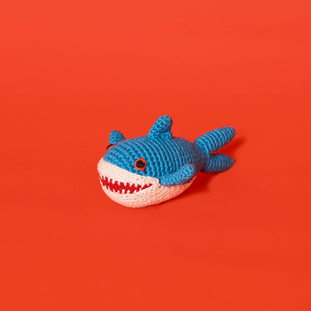Shark dog toy made from natural cotton with all-natural dyes and a built-in squeaker