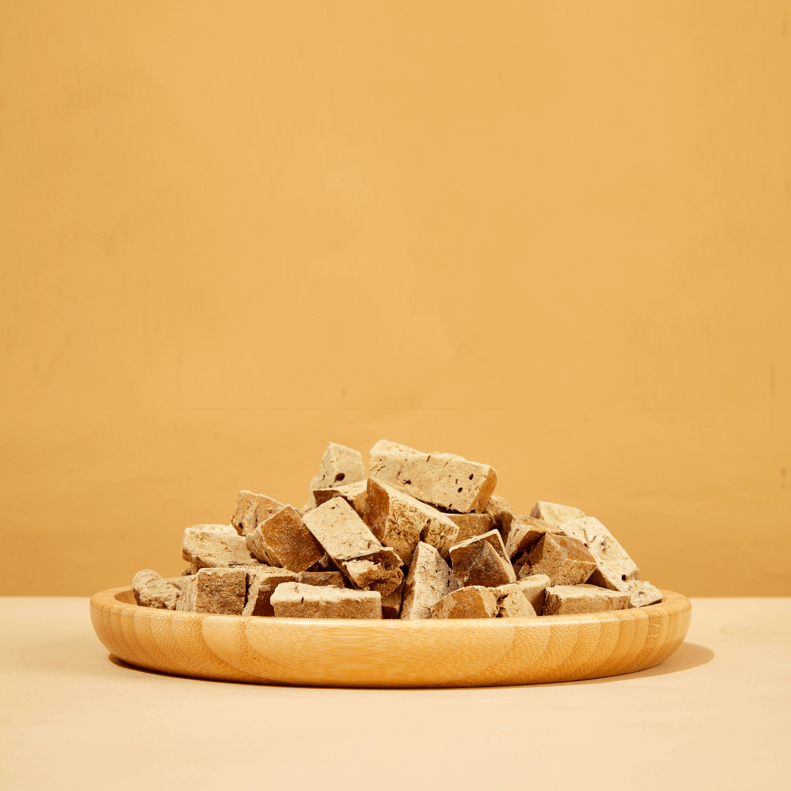 Freeze-dried beef liver dog treats showing natural texture and cube size