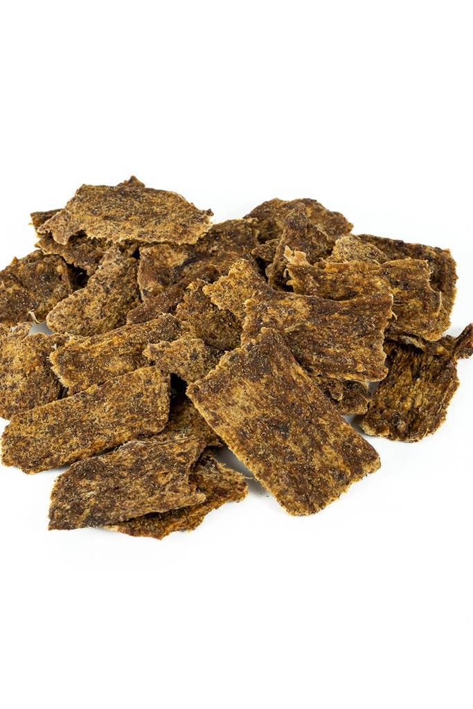 Pieces of grass-fed elk jerky dog treats made with organic ingredients