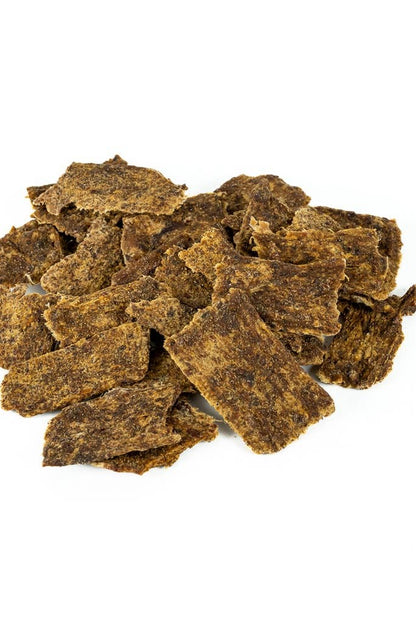 Pieces of grass-fed elk jerky dog treats made with organic ingredients