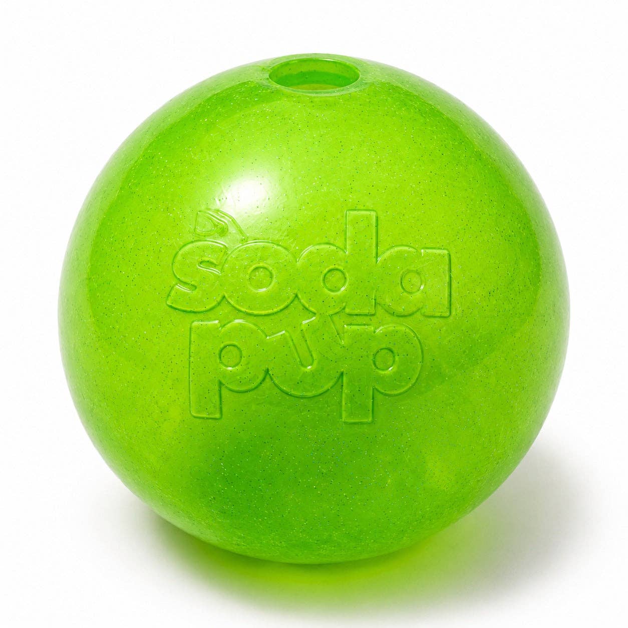 Close-up of a green glitter SodaPup dog ball made from ultra-soft rubber