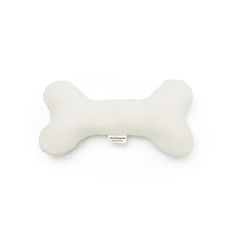 Natural hemp dog bone toy with 100% organic cotton filling for soft, gentle play