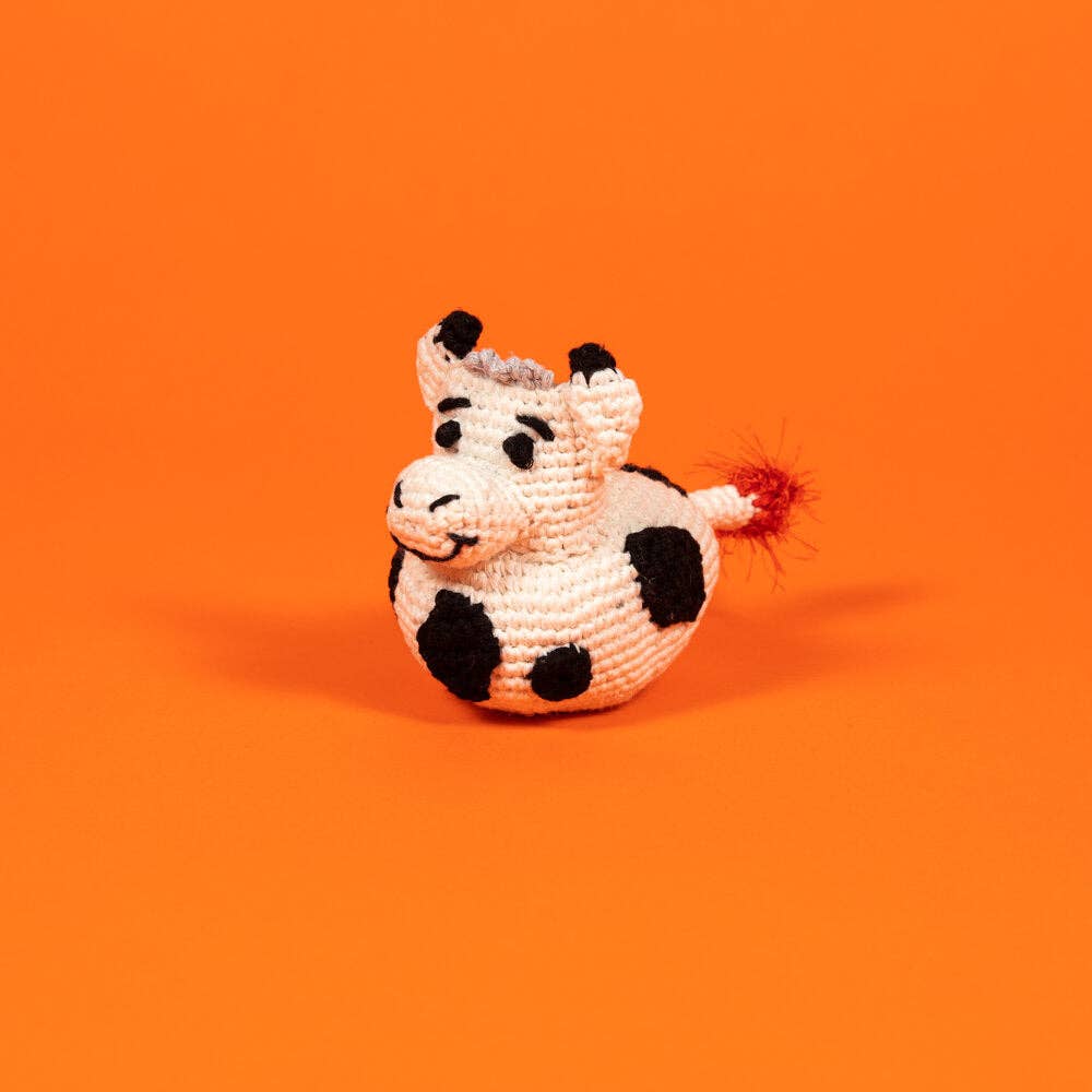 Organic cotton cow dog toy made with all-natural dyes and a built-in squeaker, non-toxic and eco-friendly