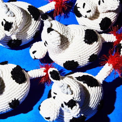 Multiple organic cotton cow dog toys made with all-natural dyes, ethically handmade and non-toxic