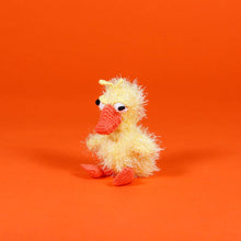 Plush duck dog toy made from organic cotton with non-toxic dyes, fair trade handmade and designed for safer, eco-friendly play