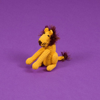 Organic cotton lion dog toy made with natural dyes. Non-toxic, hypoallergenic plush dog toy handmade fair trade for safer, eco-friendly play.