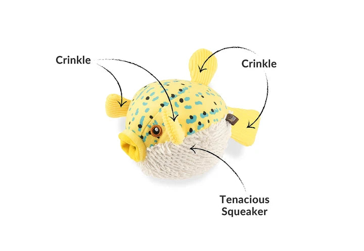 Diagram of puffer fish dog toy highlighting its crinkles, cuddly plush exterior, and hidden spiked squeaker ball