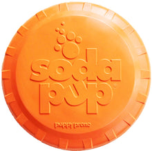 Durable orange rubber dog frisbee made from non-toxic, FDA-compliant material for safe fetch play.