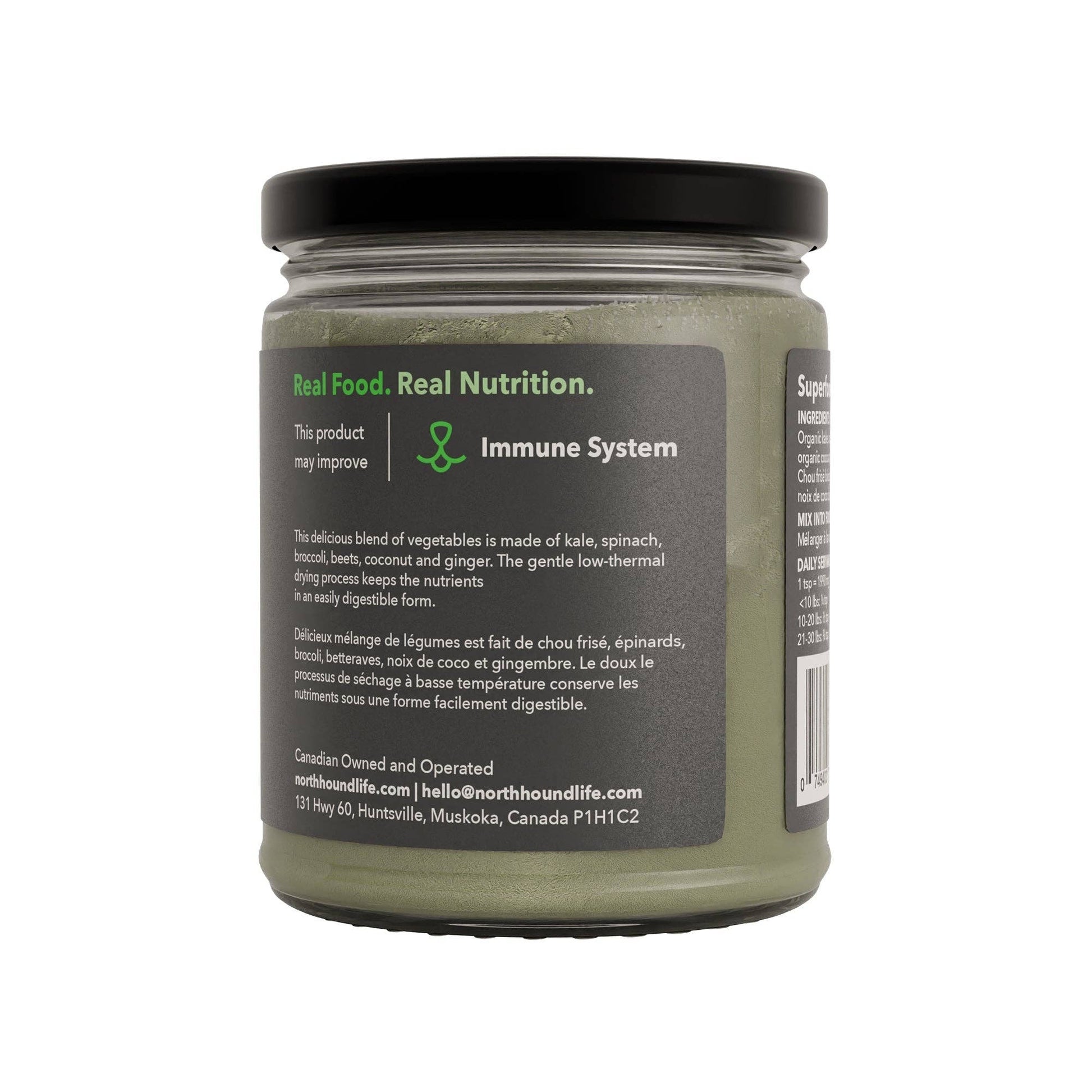 Organic vegetable powder for dogs showing fine texture and greens blend