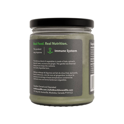 Organic vegetable powder for dogs showing fine texture and greens blend