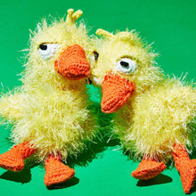 Two organic cotton plush duck dog toys made with non-toxic dyes, ethically handmade for sustainable, everyday play