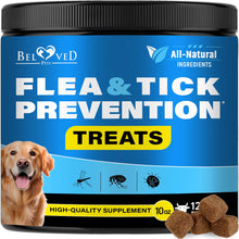 Flea and tick prevention treats for dogs with a blue label and visible treats.