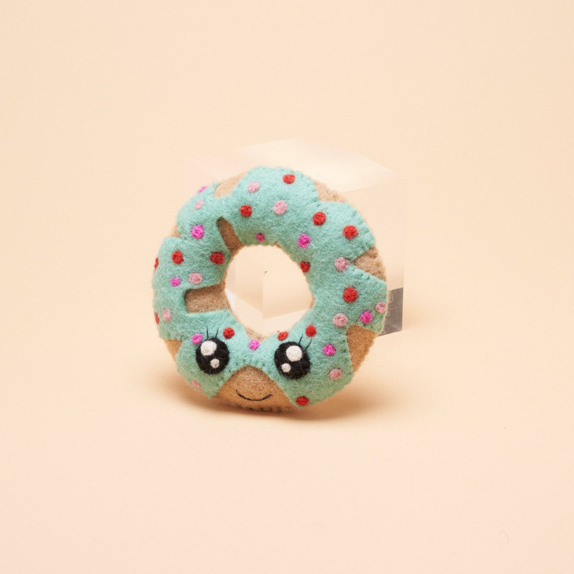 Blue donut-shaped dog toy from Gone to the Dogs, designed for fun and durability. Made with pet-safe materials for chewing, fetching, and interactive play.