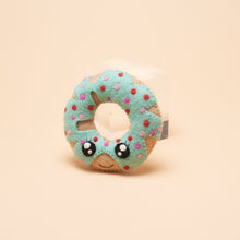 Blue donut-shaped dog toy from Gone to the Dogs, designed for fun and durability. Made with pet-safe materials for chewing, fetching, and interactive play.