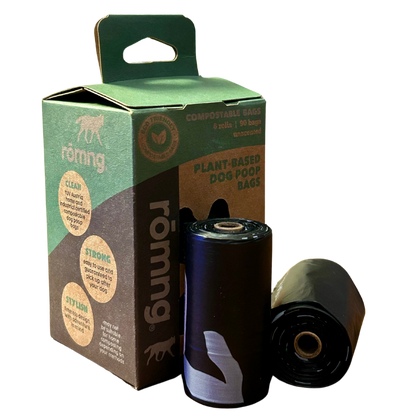 rōmng compostable biodegradable dog poop bags with plant-based packaging and rolls shown.