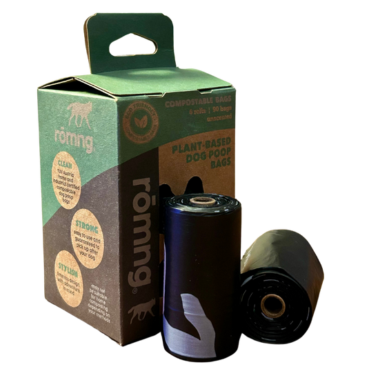 rōmng compostable biodegradable dog poop bags with plant-based packaging and rolls shown.