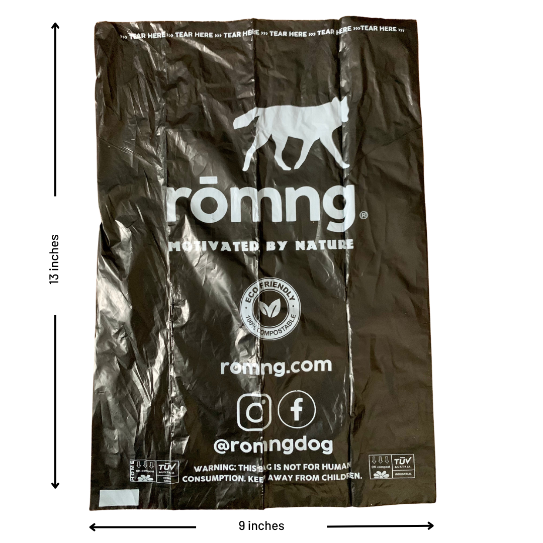 Close-up of rōmng compostable dog poop bag showing size and durable plant-based material.
