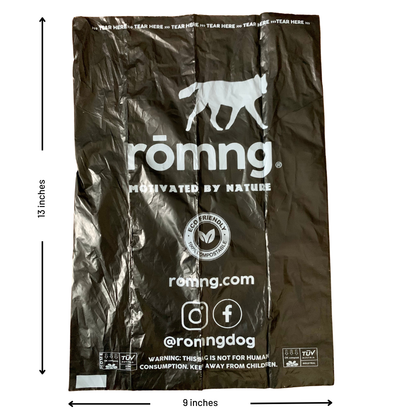 Close-up of rōmng compostable dog poop bag showing size and durable plant-based material.