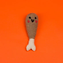 Drumstick-shaped dog toy by Ware of the Dog, designed for playful pups. Made with durable, non-toxic materials, perfect for chewing, fetching, or tugging. Adds a touch of fun and whimsy to your dog's playtime.